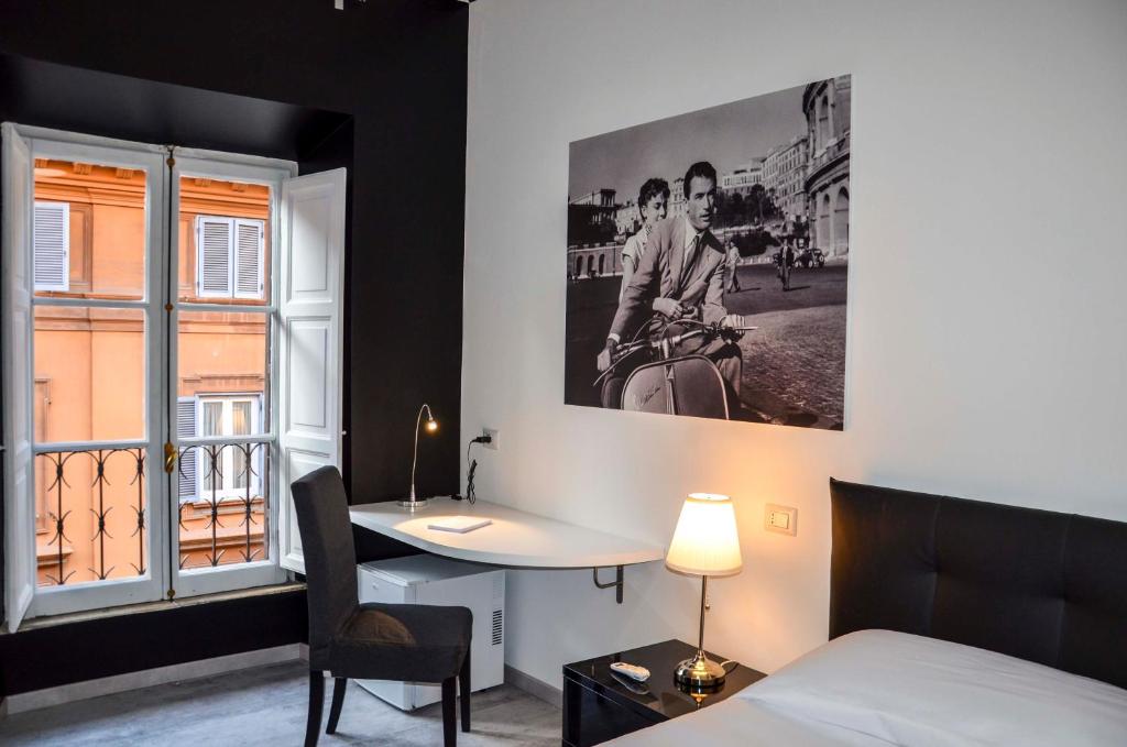 Кровать или кровати в номере Good Life Via Veneto