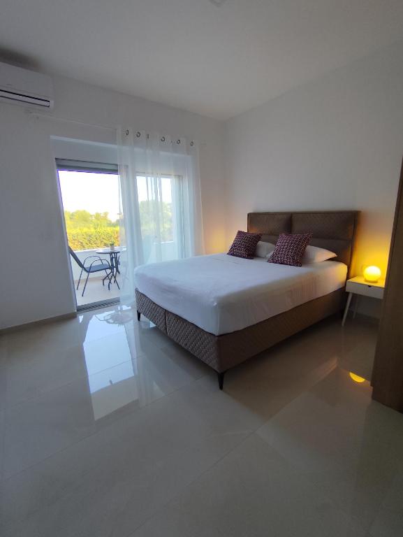 Ліжко або ліжка в номері Guest House AGA