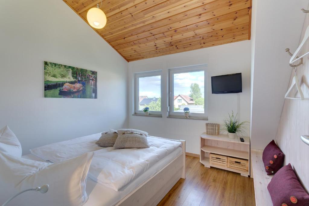 Postel nebo postele na pokoji v ubytování Spreewaldferienhaus