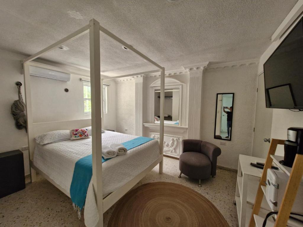 Postel nebo postele na pokoji v ubytování Hotel Downtown Merida
