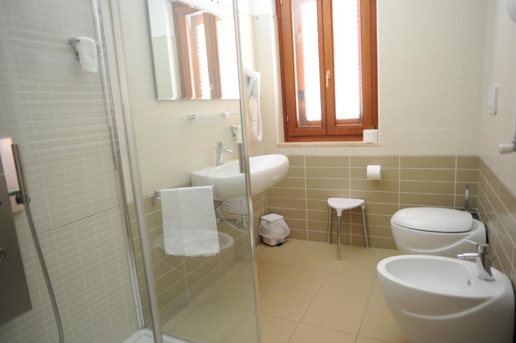 Koupelna v ubytování Hotel Il Querceto