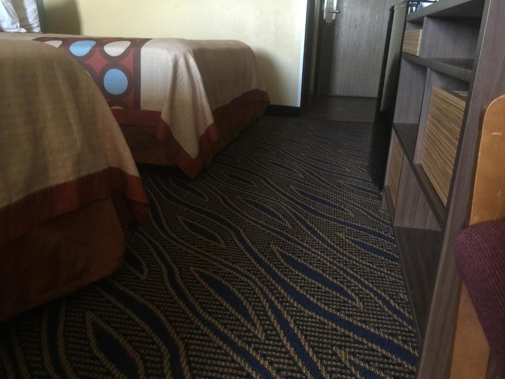 Postel nebo postele na pokoji v ubytování Super 8 by Wyndham Cedar City