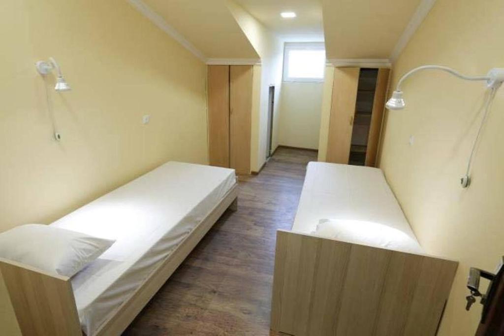 Postel nebo postele na pokoji v ubytování Your Hostel
