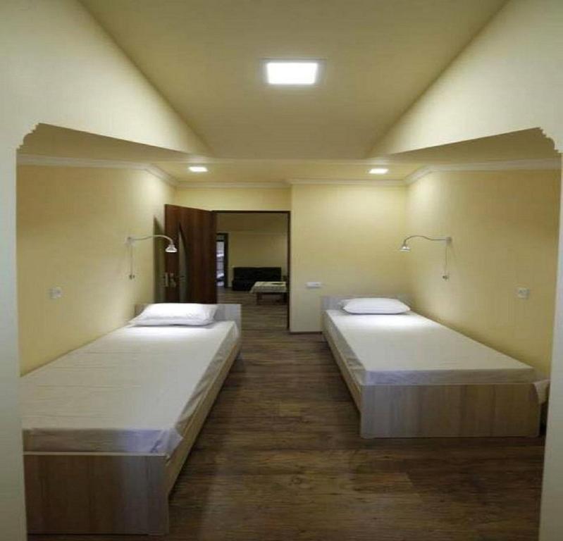 Postel nebo postele na pokoji v ubytování Your Hostel