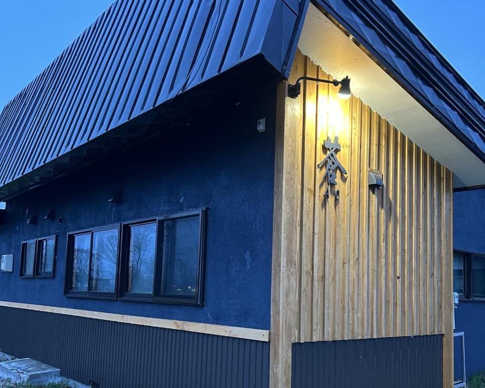 a blue building with a star on the side of it at AtreyuーAO - Vacation STAY 35800v in Teshikaga