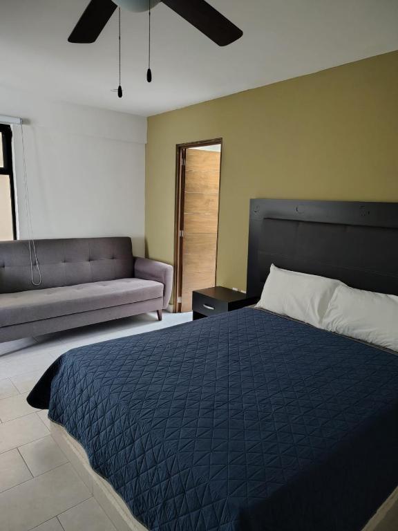 Postel nebo postele na pokoji v ubytování Hotel Casa 20