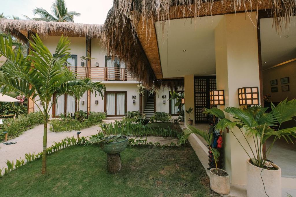Zahrada ubytování UNLTD Siargao Hotel
