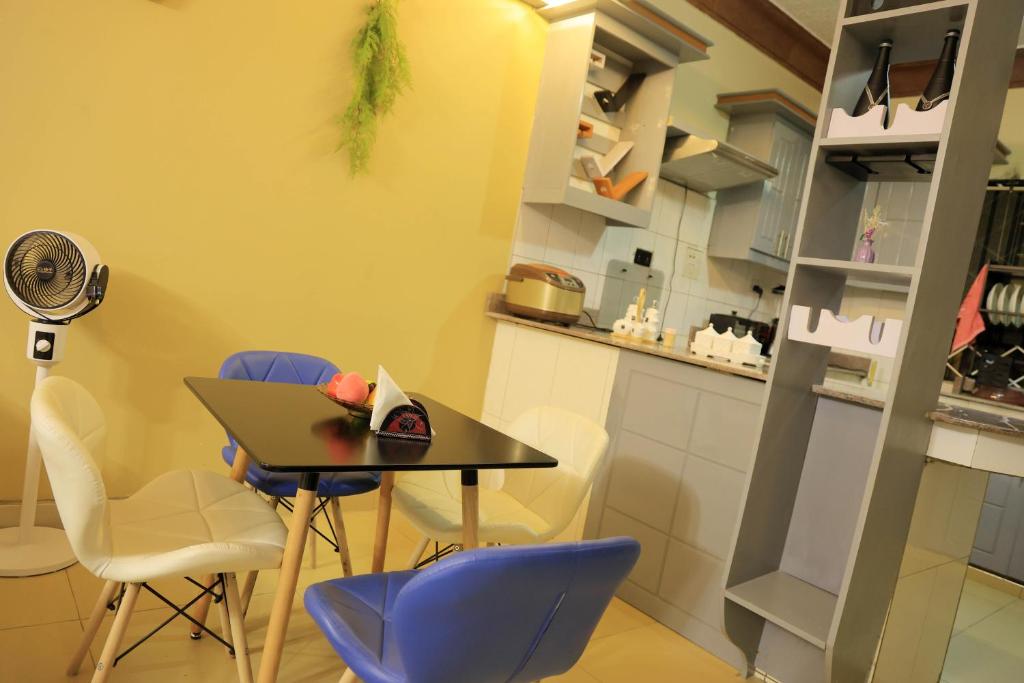 Kuchyň nebo kuchyňský kout v ubytování AG Home - Kampala