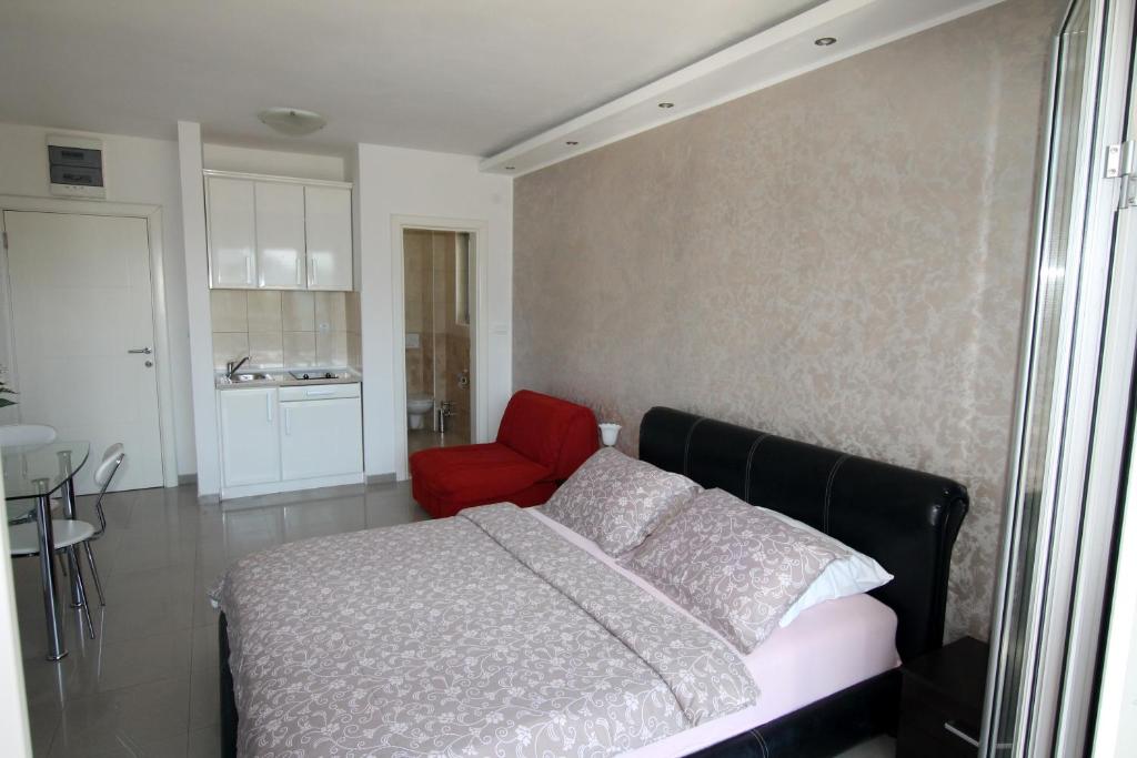 Postel nebo postele na pokoji v ubytování Montesun Residence