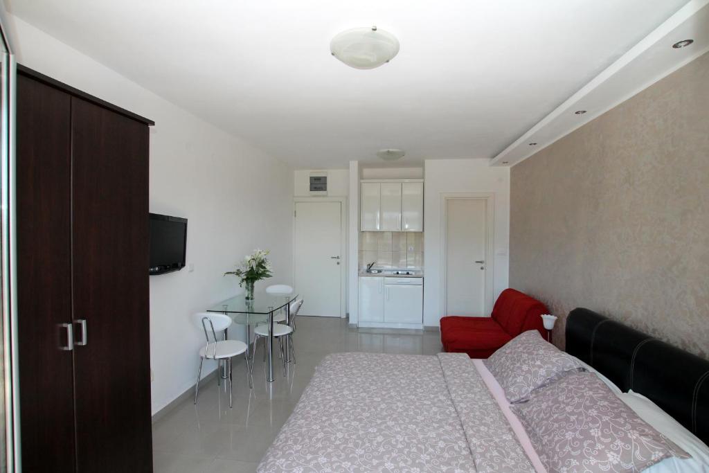 Postel nebo postele na pokoji v ubytování Montesun Residence
