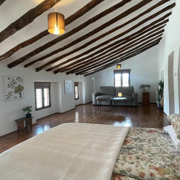 Postel nebo postele na pokoji v ubytování Hotel Casa Pedro Barrera
