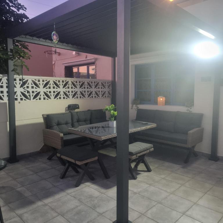 Patio lub wspólna przestrzeń na świeżym powietrzu w obiekcie Apartamento Tanzanita