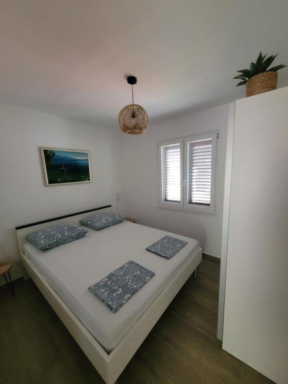 Postel nebo postele na pokoji v ubytování Apartment Tonka