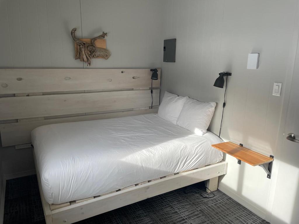 Postel nebo postele na pokoji v ubytování Pinewood Inn