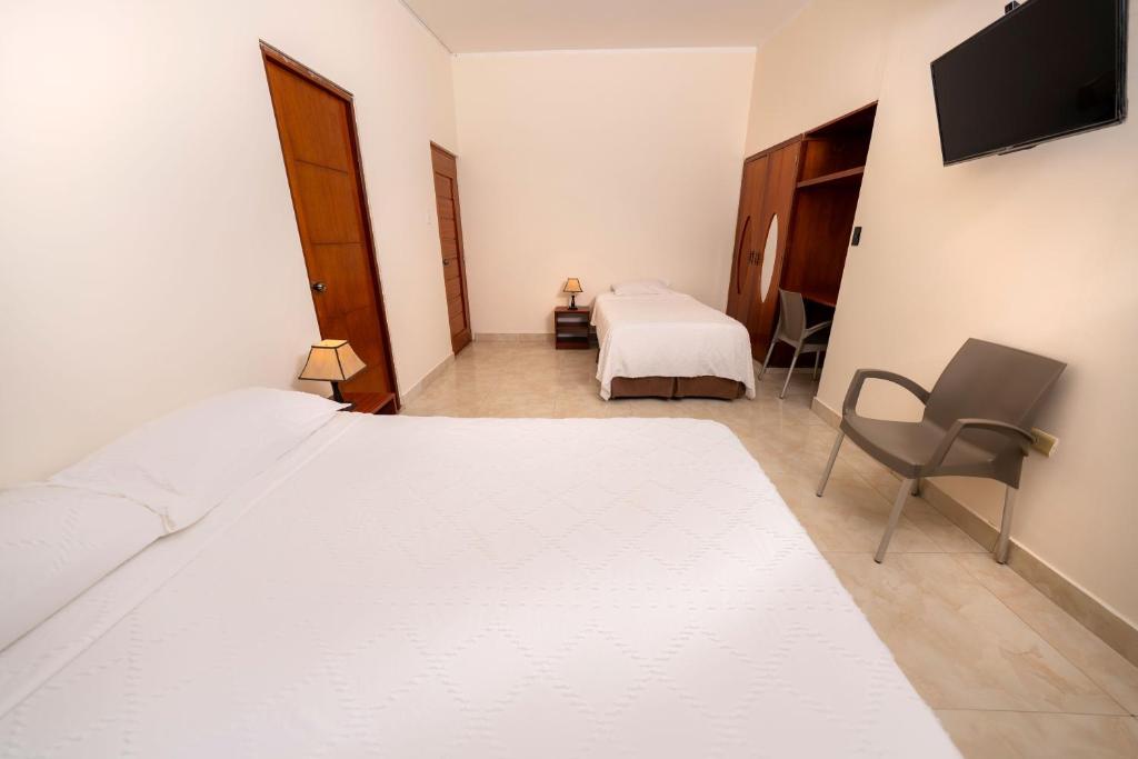 Postel nebo postele na pokoji v ubytování Paraiso Wasi