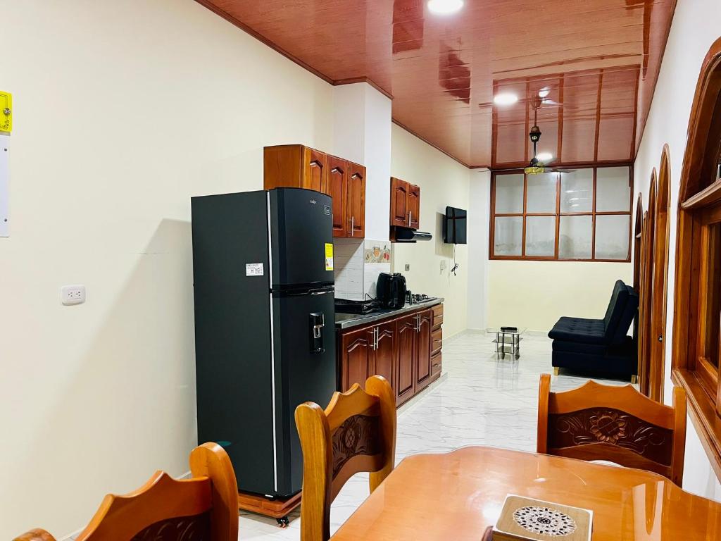 Kuchyň nebo kuchyňský kout v ubytování Aparta Hotel Horinthia