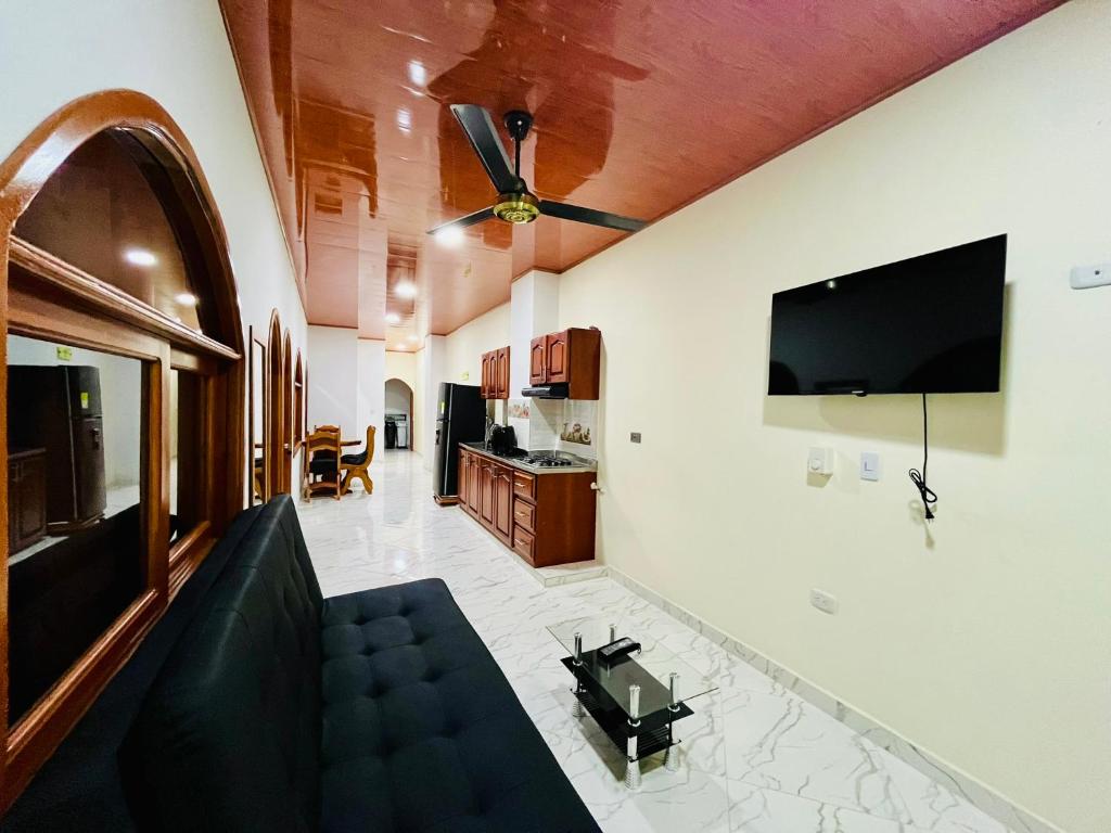 Kuchyň nebo kuchyňský kout v ubytování Aparta Hotel Horinthia