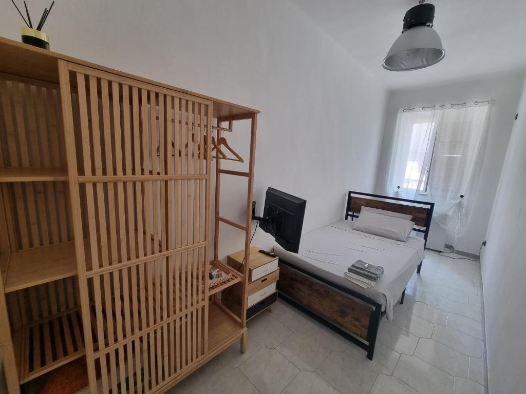 Postel nebo postele na pokoji v ubytování Civico 89 affittacamere