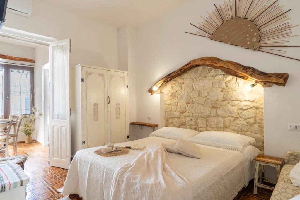 Postel nebo postele na pokoji v ubytování B&B Steddueoro