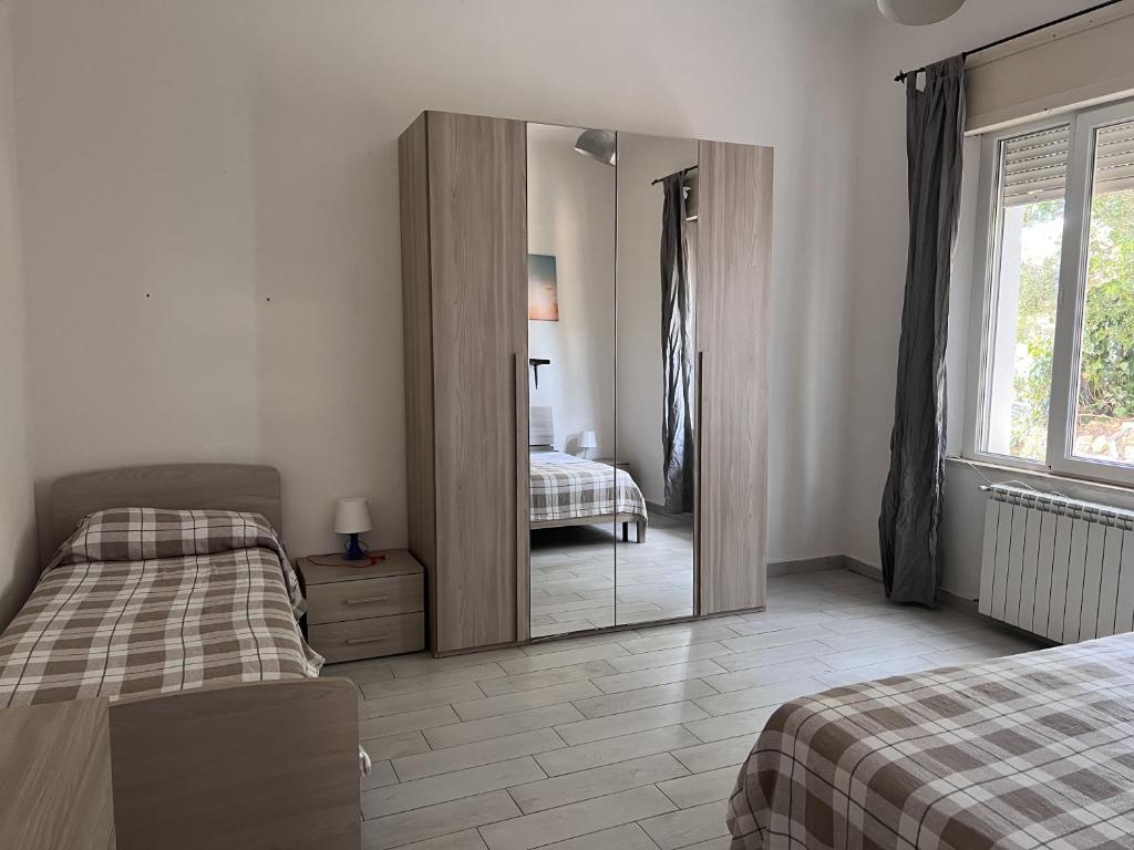 Postel nebo postele na pokoji v ubytování La Quercetta