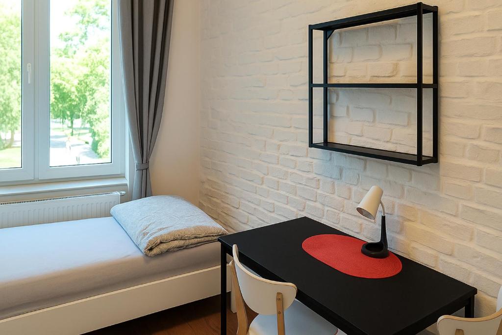 Uma cama ou camas num quarto em Babel Hostel, Dworzec PKP, Rynek