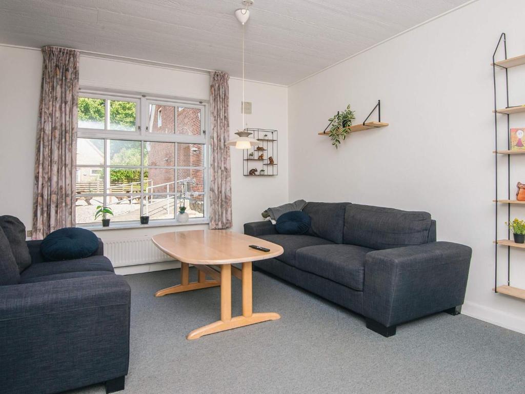 Posezení v ubytování Holiday home Højer III