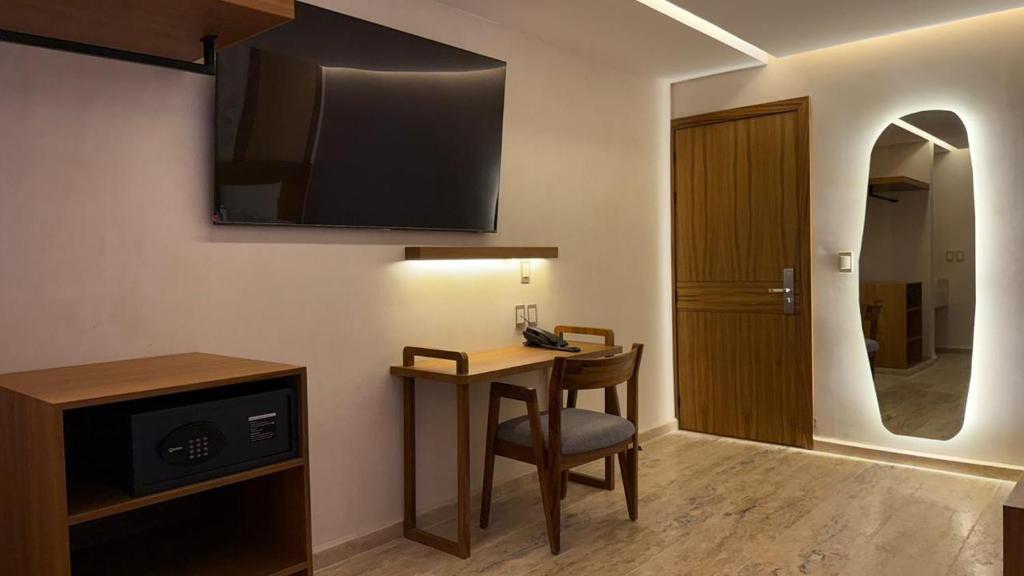 TV a/nebo společenská místnost v ubytování Hotel Makkan Boca