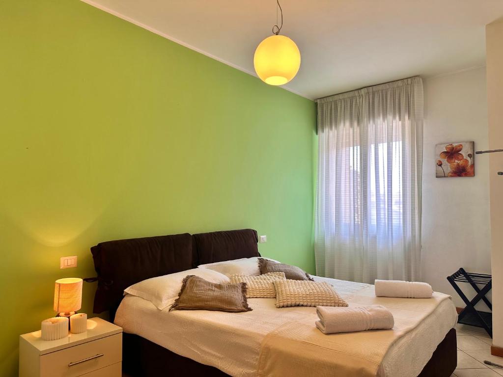 Ένα ή περισσότερα κρεβάτια σε δωμάτιο στο Casa di Chiara