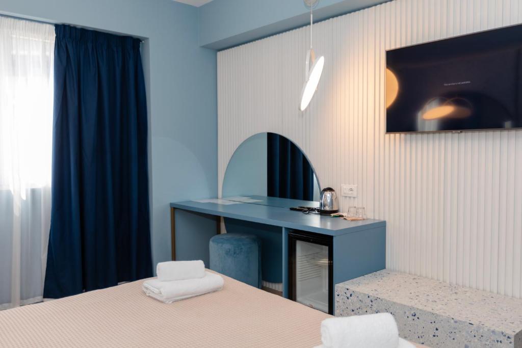 Postel nebo postele na pokoji v ubytování Imperial Visar Rooms