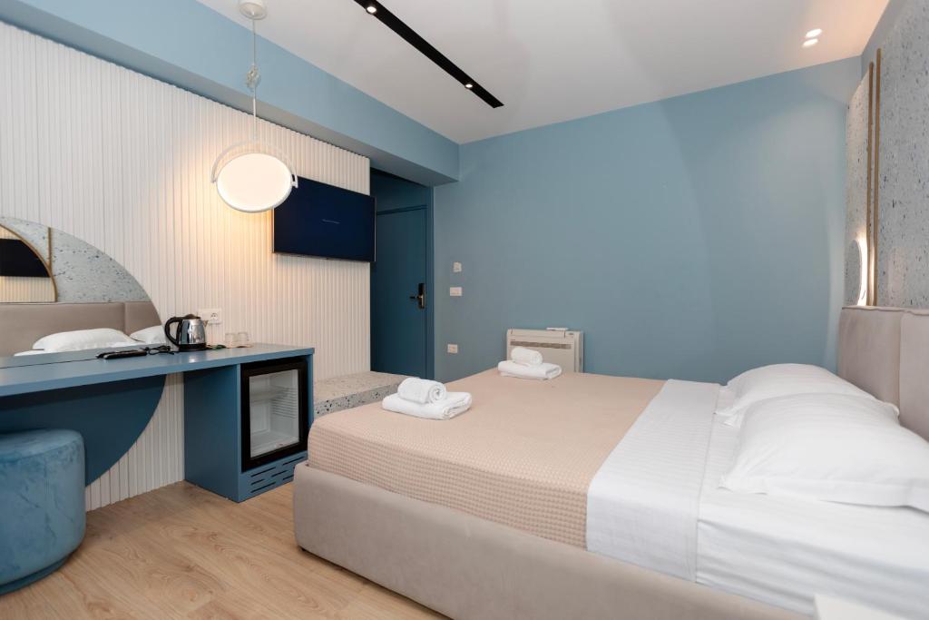 Postel nebo postele na pokoji v ubytování Imperial Visar Rooms