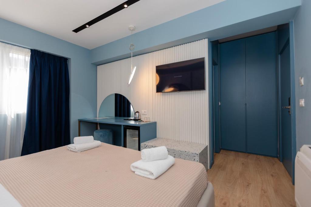 Postel nebo postele na pokoji v ubytování Imperial Visar Rooms