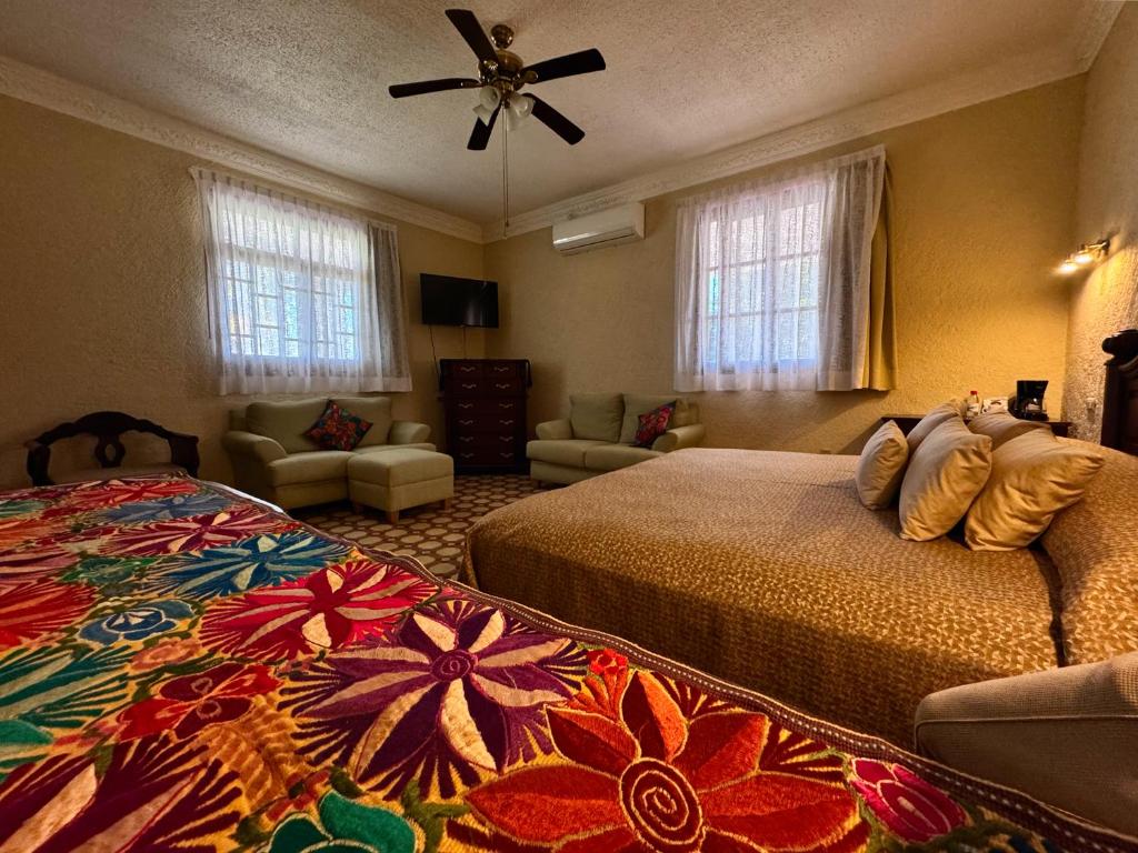 Postel nebo postele na pokoji v ubytování Finca Garullo Hotel Boutique