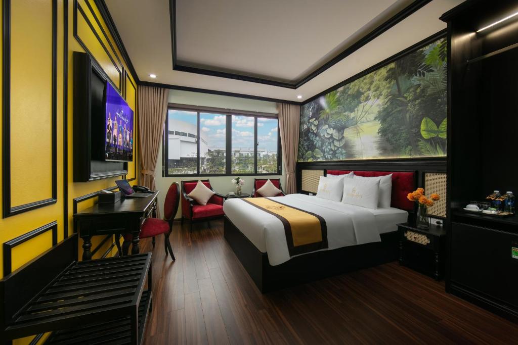 TV a/nebo společenská místnost v ubytování Grand Hanoi Hotel