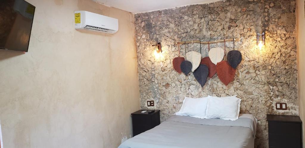 Postel nebo postele na pokoji v ubytování Casa "Los Jarochos" sencilla