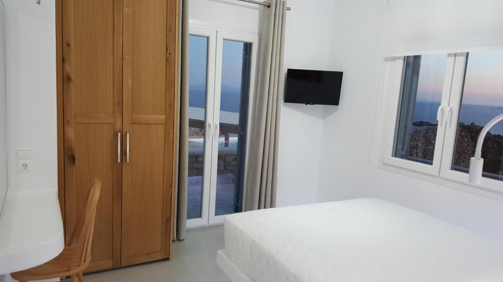 Postel nebo postele na pokoji v ubytování Otherview Villa