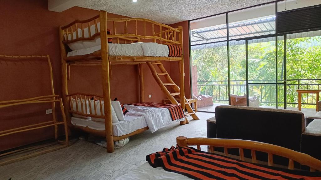 Postel nebo postele na pokoji v ubytování Forest Rawana homestay Ella