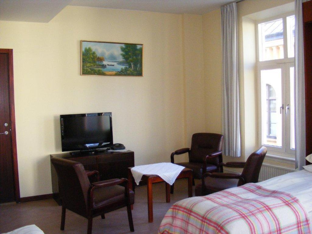 TV a/nebo společenská místnost v ubytování Hotel Continental Malmö