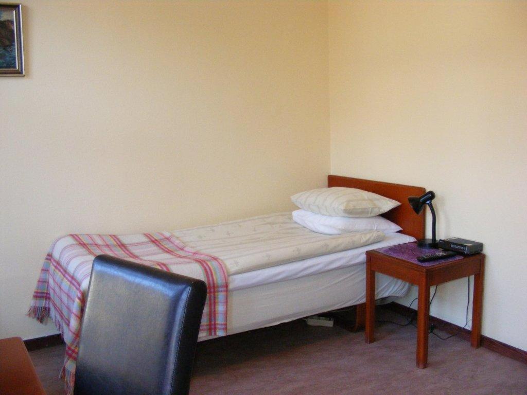 Postel nebo postele na pokoji v ubytování Hotel Continental Malmö