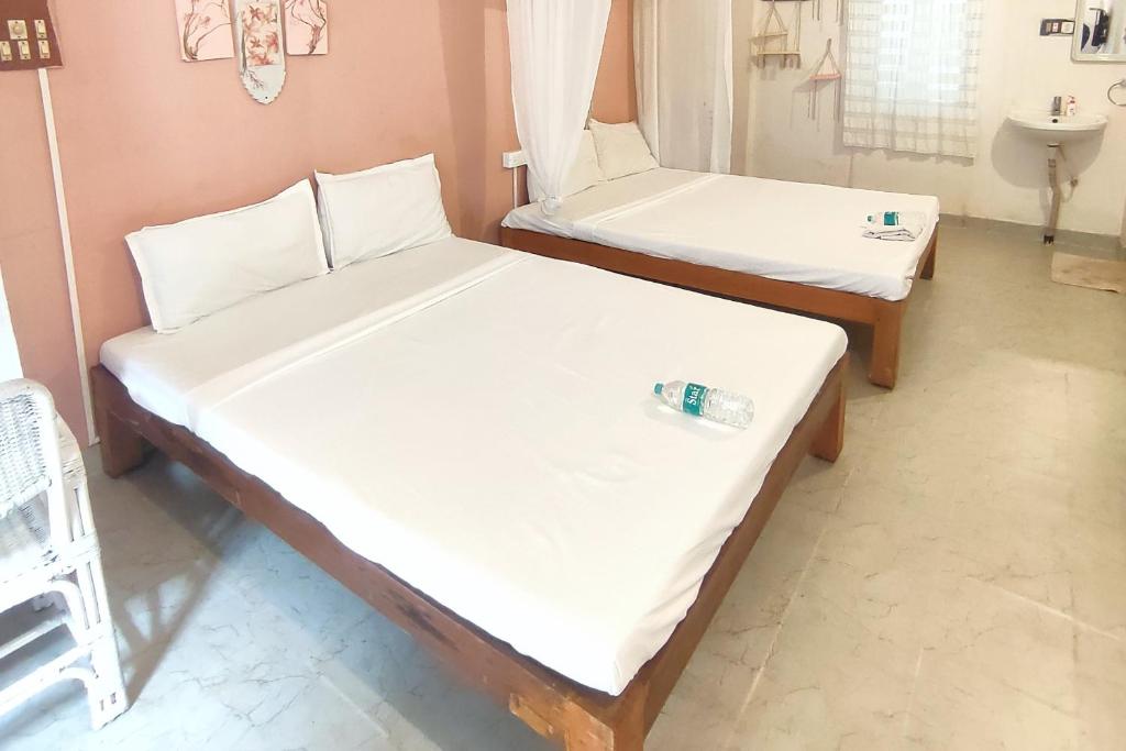 Postel nebo postele na pokoji v ubytování Vanam Pool Stay