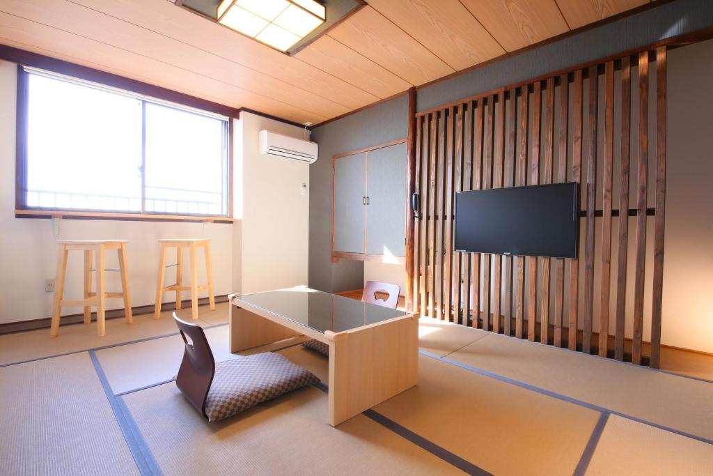 TV a/nebo společenská místnost v ubytování Nasu Ichiya Hotel