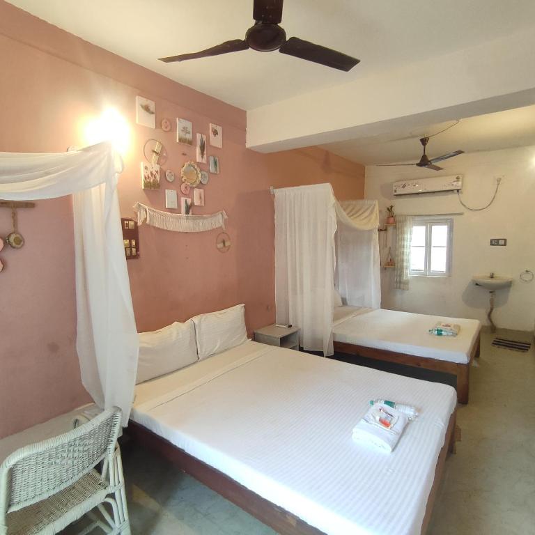 Postel nebo postele na pokoji v ubytování Vanam Pool Stay