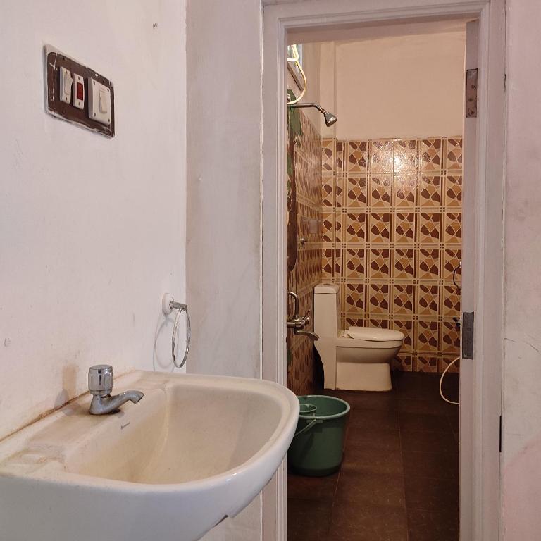Koupelna v ubytování Vanam Pool Stay