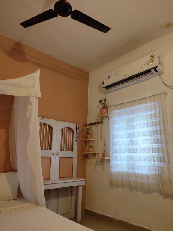 Postel nebo postele na pokoji v ubytování Vanam Pool Stay