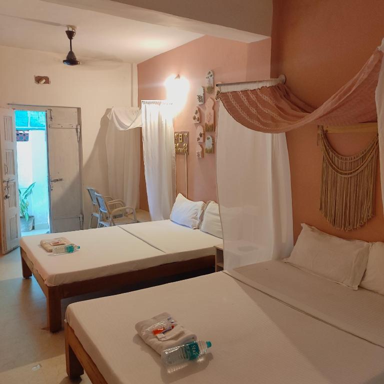 Postel nebo postele na pokoji v ubytování Vanam Pool Stay