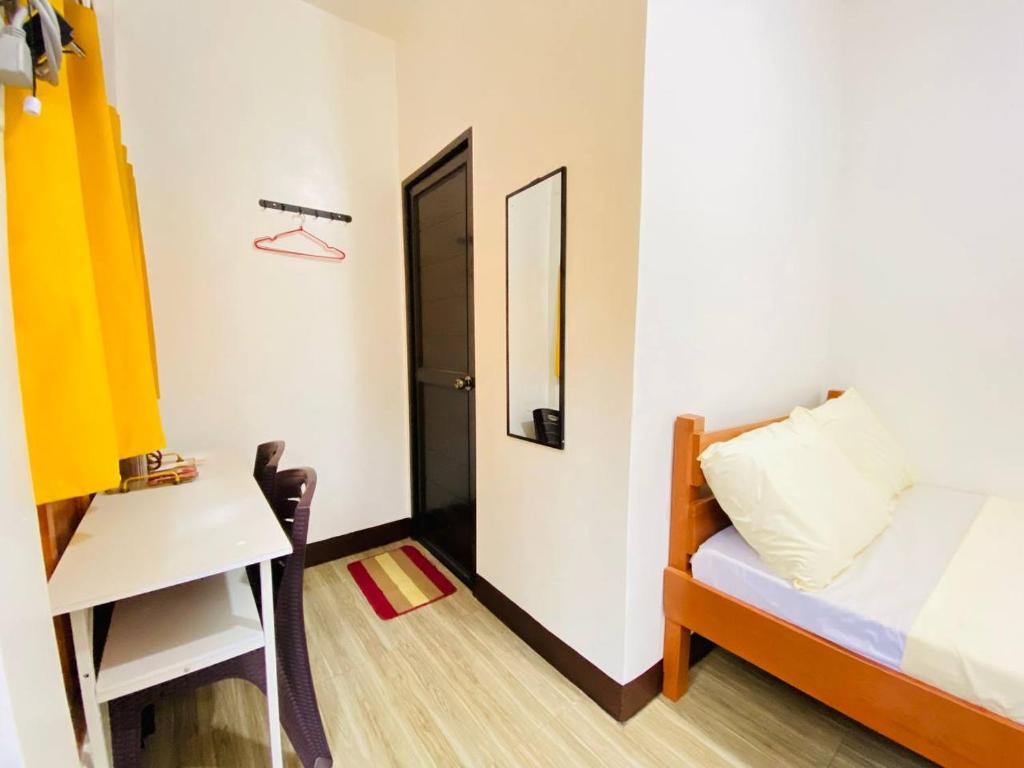 Voodi või voodid majutusasutuse Sudla Siargao Hostel toas