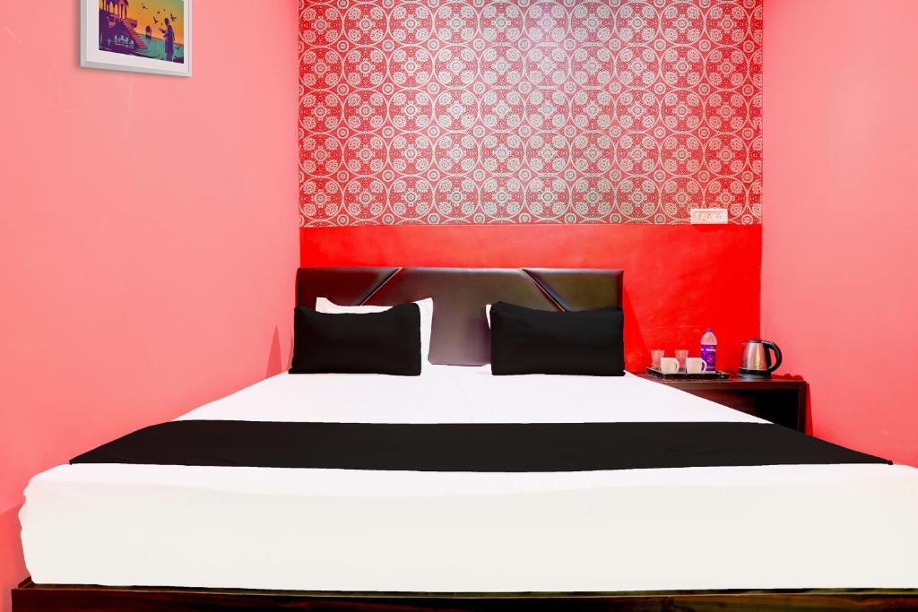 Postel nebo postele na pokoji v ubytování Hotel O Rewansh in