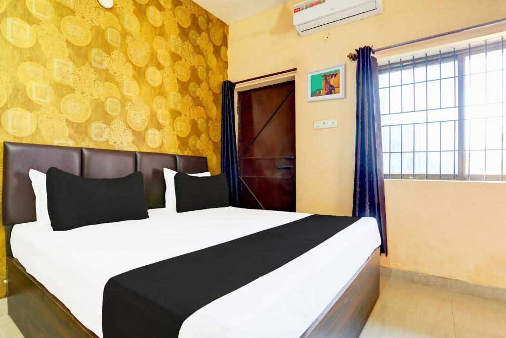 Postel nebo postele na pokoji v ubytování Hotel O Rewansh in