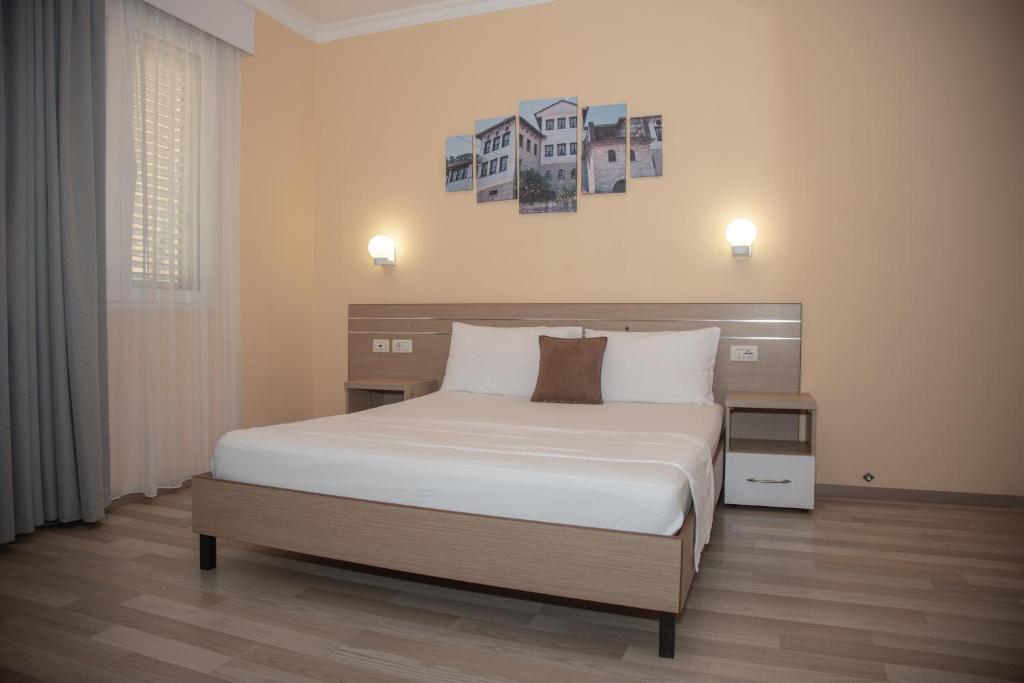 Postel nebo postele na pokoji v ubytování Hotel Number One