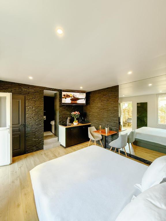 Posteľ alebo postele v izbe v ubytovaní L'Oxalis villa (L'Osmanthus), Logement avec balnéothérapie privée