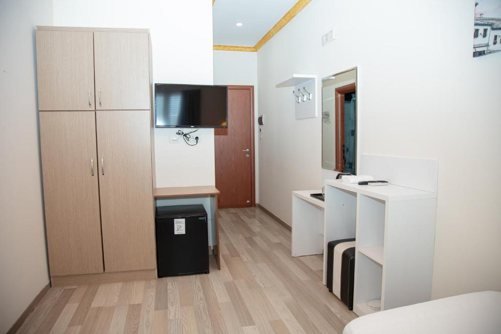 Kuchyň nebo kuchyňský kout v ubytování Hotel Number One